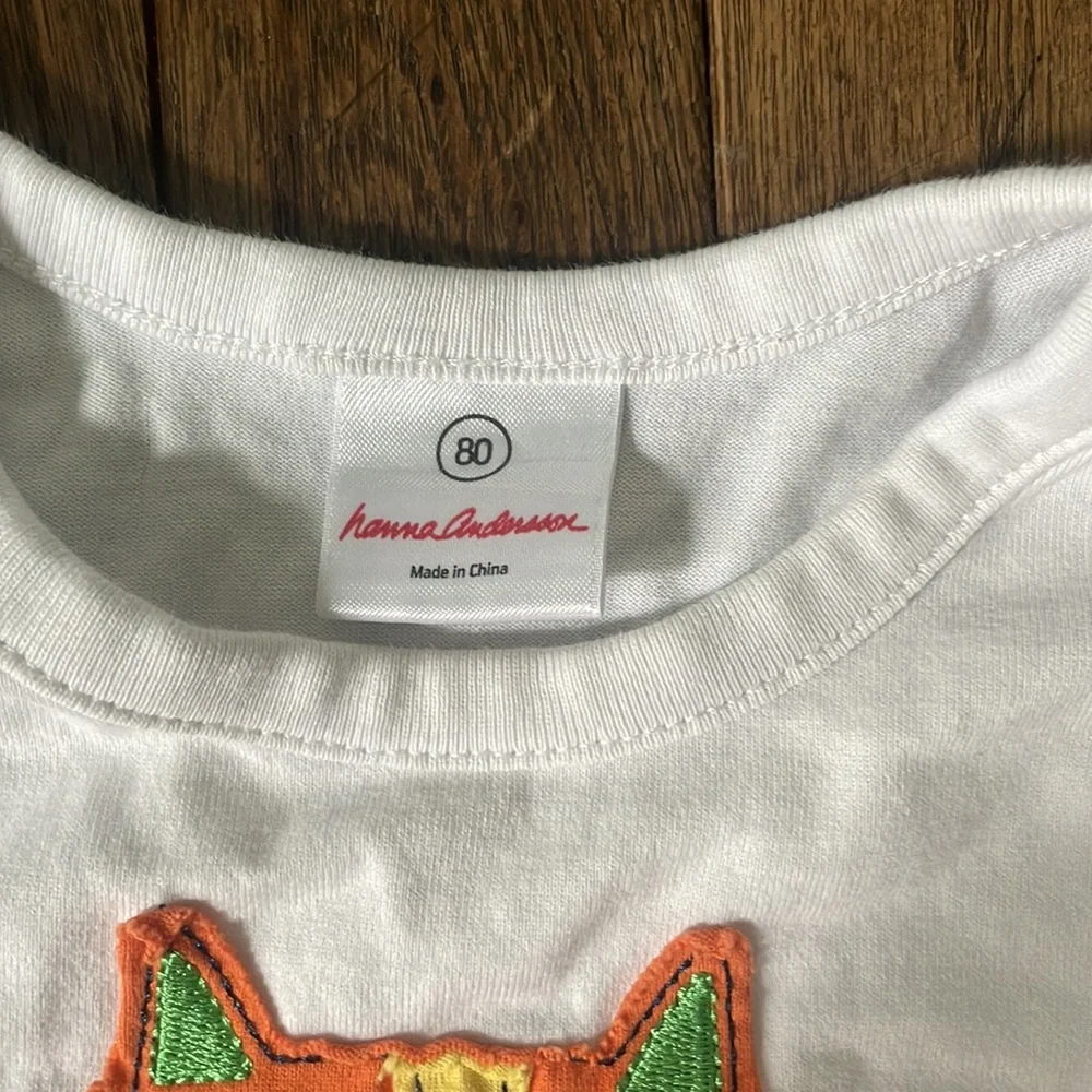 Hanna Andersson appliqué onesie for baby